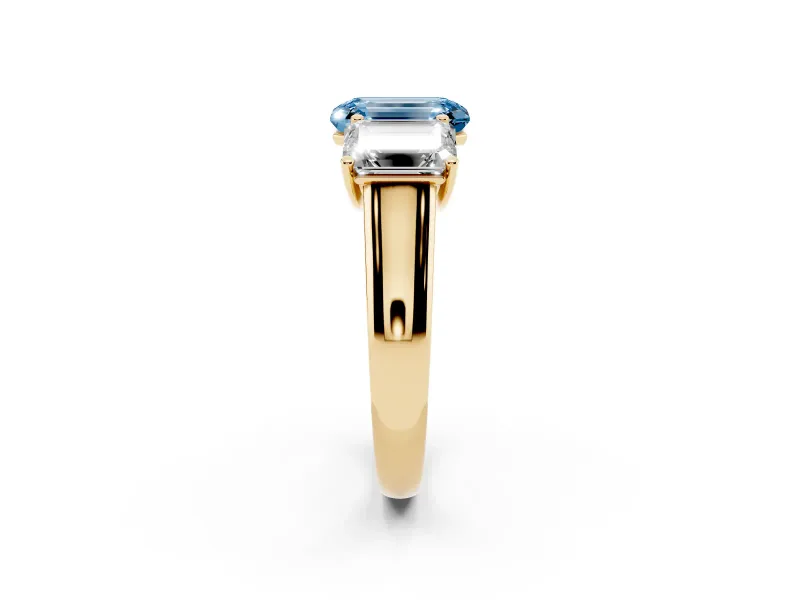 Emerald Cut Three Stone Engagement Ring Setting for a Fancy Blue Lab-Grown Diamond | Basket Prong Heads | Yellow Gold