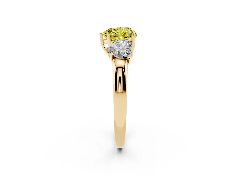 Fancy Yellow Heart Cut Diamond Three-Stone Ring Set in Yellow gold with Bold Center and Classic Band