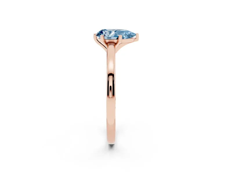 Fancy Blue Pear Cut Diamond Solitaire Engagement Ring Set in Rose gold with Prong Setting on a Classic Band