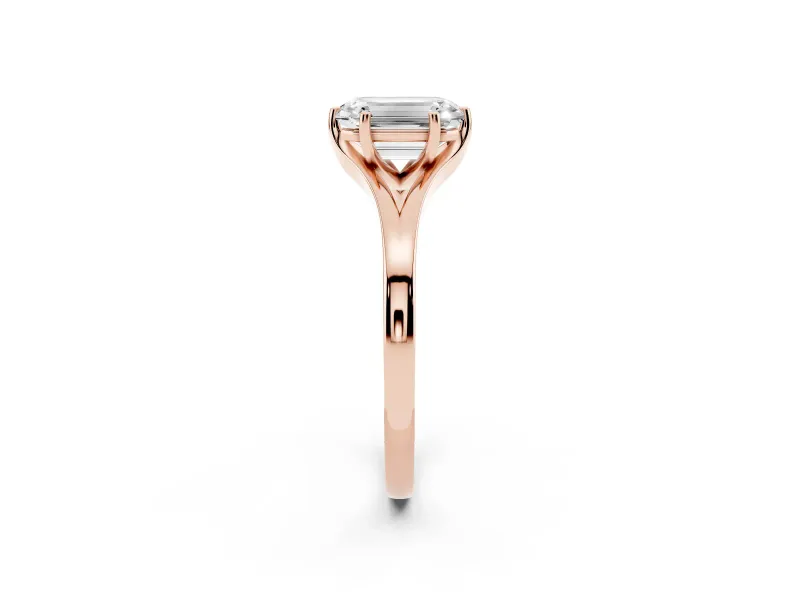 Emerald Cut Diamond Solitaire Ring Set in Rose gold with Polished Tapered Band and Prong Setting