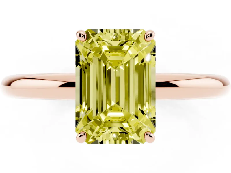 Fancy Yellow Emerald Cut Diamond Solitaire Ring Set in Rose gold with Prong Setting on a Polished Plain Band