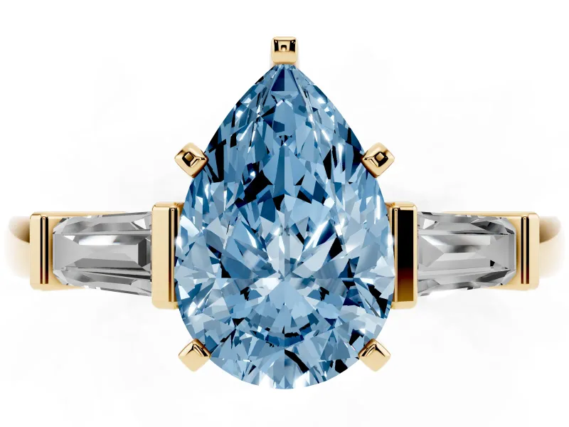 Fancy Blue Pear Cut Diamond Solitaire Ring Set in Yellow gold with Tapered Baguette Accents and Prong Setting
