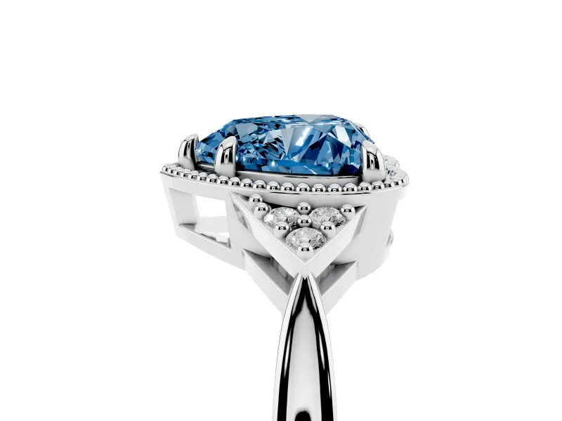 Fancy Blue Heart Cut Diamond Milgrain Solitaire Ring Set in White gold with Tapered Pavé Band and Prong Setting