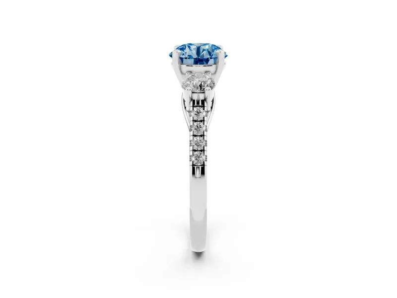 Fancy Blue Three-Stone Round Cut Diamond Pavé Band Ring Set in Platinum with Prong-Set Trio