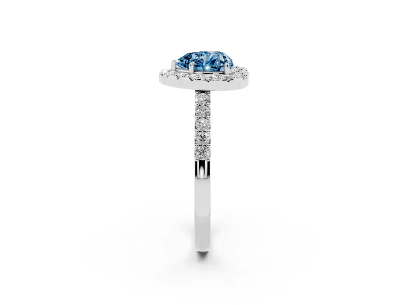 Fancy Blue Heart Cut Diamond Halo Pavé Solitaire Ring Set in Platinum with Prong-Set Center Stone