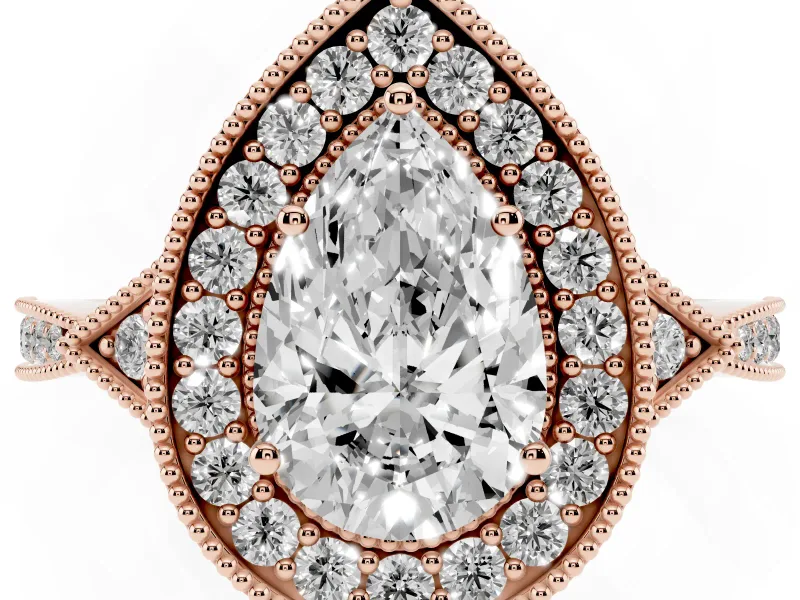 Pear Cut Diamond Halo Engagement Ring Set in Rose gold with Milgrain Pavé Band