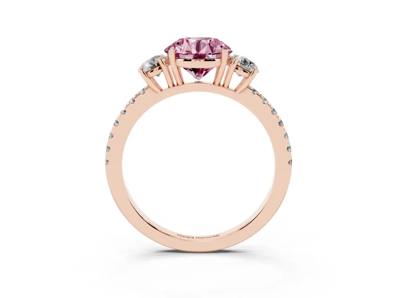 Fancy Pink Round Cut Diamond Three-Stone Ring Set in Rose gold with Pavé Band and Graduated Sides