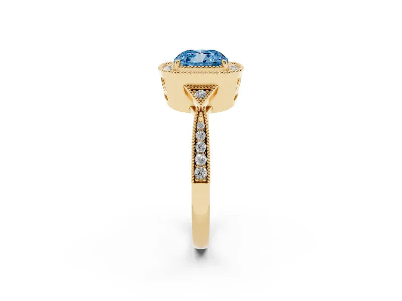 Fancy Blue Cushion Cut Diamond Halo Engagement Ring Set in Yellow gold with Milgrain Pavé Band