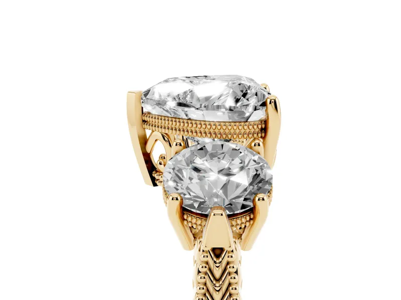 Heart Cut Diamond Three-Stone Ring Set in Yellow gold with Milgrain Band