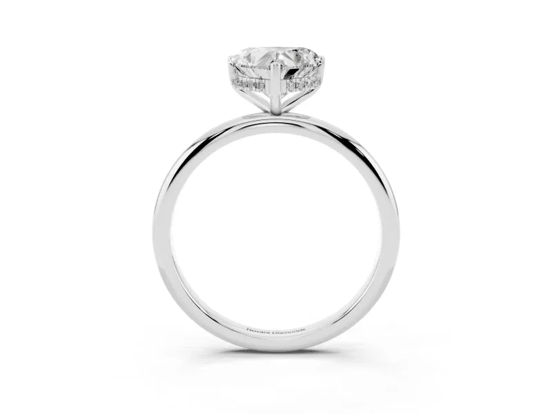 Heart Cut Diamond Solitaire Engagement Ring Set in White gold with Prong Setting and Polished Band