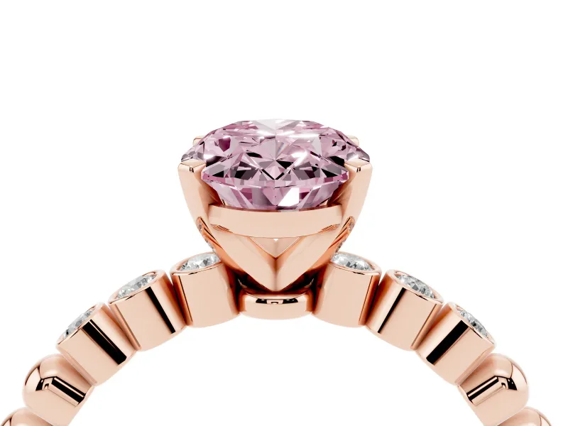 Fancy Pink Oval Cut Diamond Solitaire Engagement Ring Set in Rose gold with Bezel Accents on Beaded Band