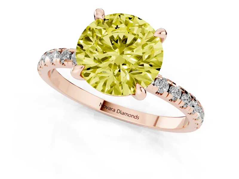 Fancy Yellow Round Cut Diamond Brilliant Solitaire Ring Set in Rose gold with Pavé Band and Prong Setting