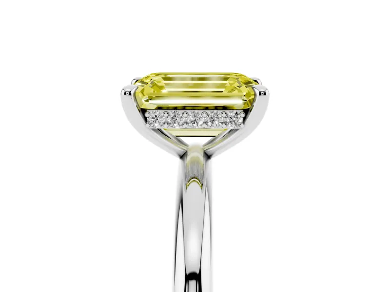 Fancy Yellow Emerald Cut Diamond Solitaire Ring Set in Silver with Thin Band and Prong Setting
