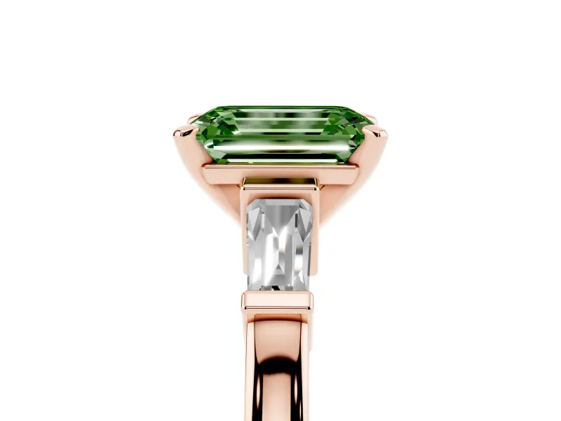 Fancy Green Emerald Cut Diamond Solitaire Ring Set in Rose gold with Tapered Baguette Accents and Prong Setting