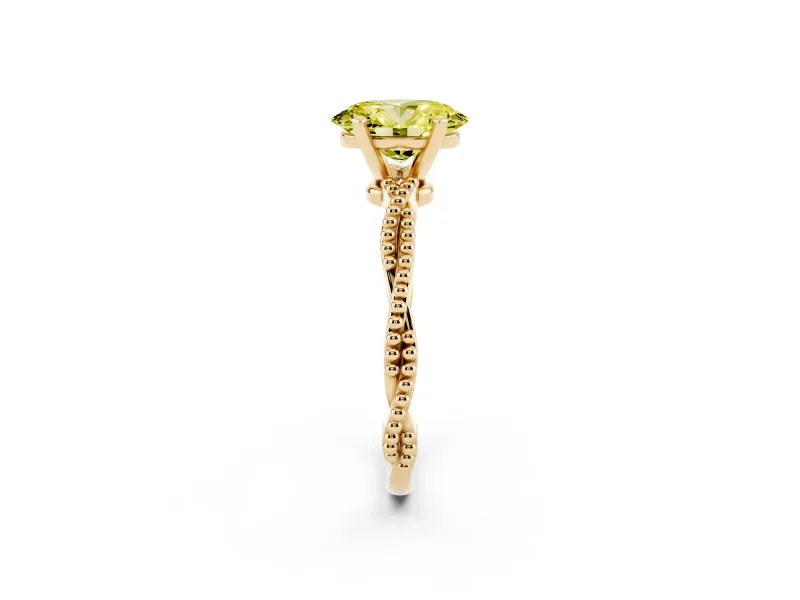 Fancy Yellow Oval Cut Diamond Solitaire Ring Set in Yellow gold with Twisted Band and Bead Prong Setting