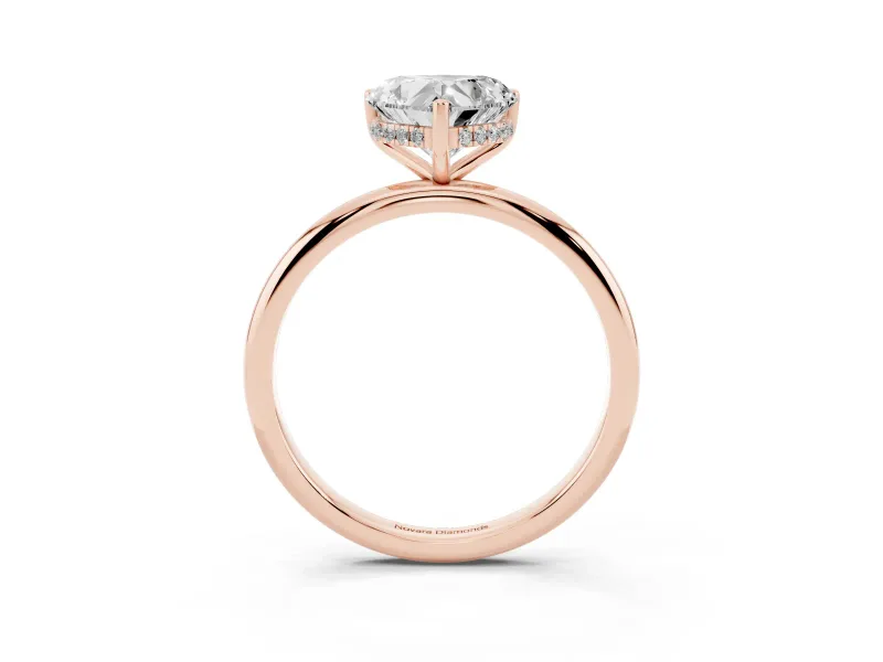 Heart Cut Diamond Solitaire Engagement Ring Set in Rose gold with Prong Setting and Polished Band