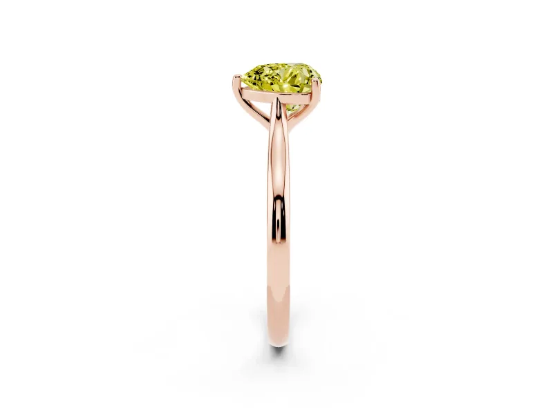 Fancy Yellow Heart Cut Diamond Solitaire Ring Set in Rose gold with Cathedral Band and Prong Setting