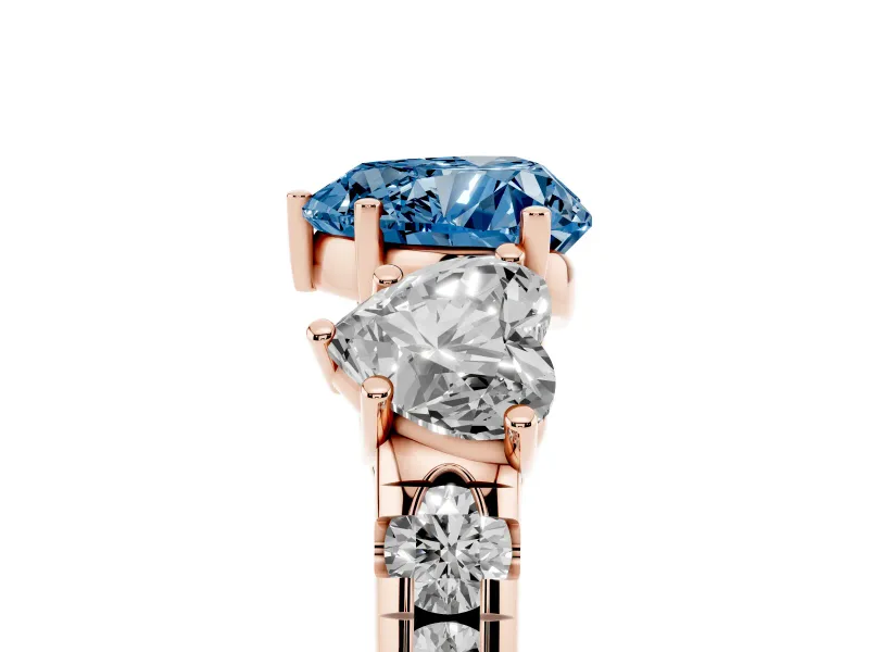 Heart-Shaped Three Stone Engagement Ring Setting for a Fancy Blue Lab-Grown Diamond | Accented Shoulders | Rose Gold