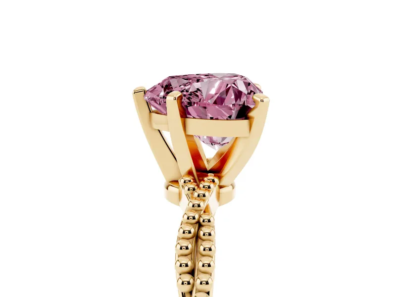 Fancy Pink Heart Cut Diamond Solitaire Ring Set in Yellow gold with Twisted Band and Bead Prong Setting