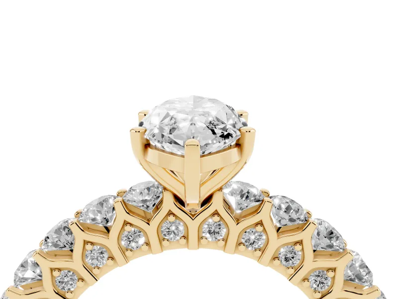 Marquise Cut Diamond Solitaire Ring Set in Yellow gold with Shared Prong Pavé Band