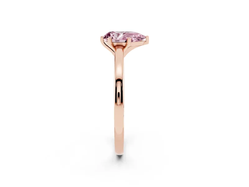 Fancy Pink Pear Cut Diamond Solitaire Engagement Ring Set in Rose gold with Prong Setting on a Classic Band