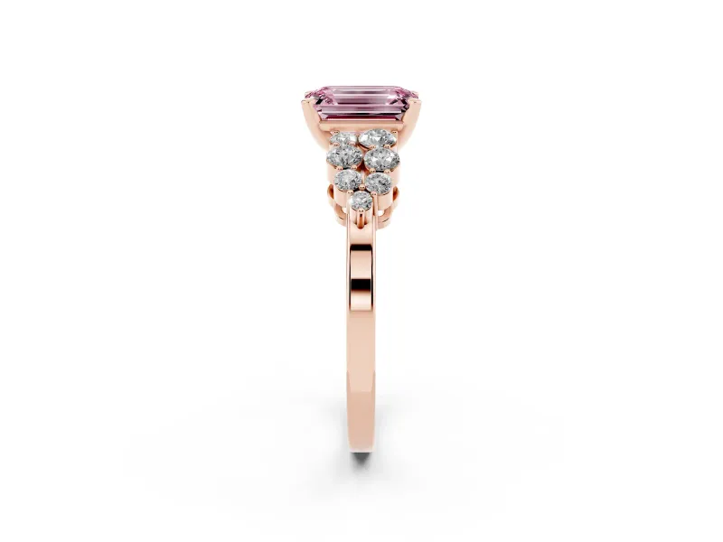Fancy Pink Emerald Cut Diamond Cluster Engagement Ring Set in Rose gold with Pavé Band and Prong Setting