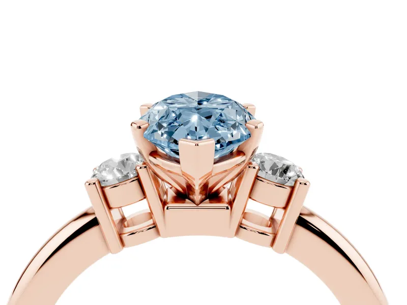 Fancy Blue Three-Stone Marquise Cut Diamond Ring Set in Rose gold with Prong Setting and Plain Band