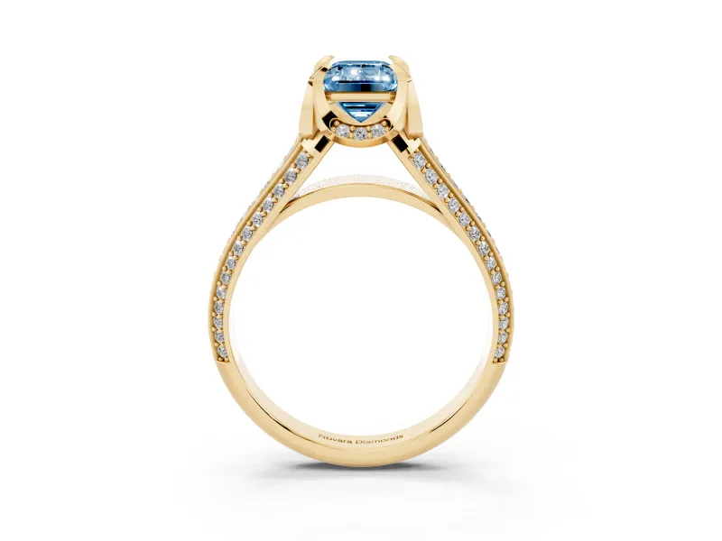 Fancy Blue Emerald Cut Diamond Pavé Split Shank Solitaire Ring Set in Yellow gold with Prong Setting