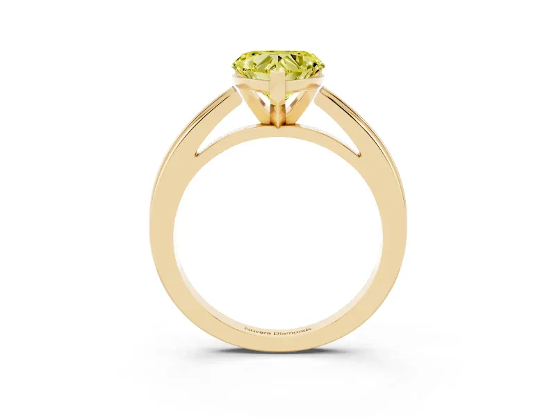 Fancy Yellow Heart Cut Diamond Solitaire Ring Set in Yellow gold with Prong Setting and Classic Band