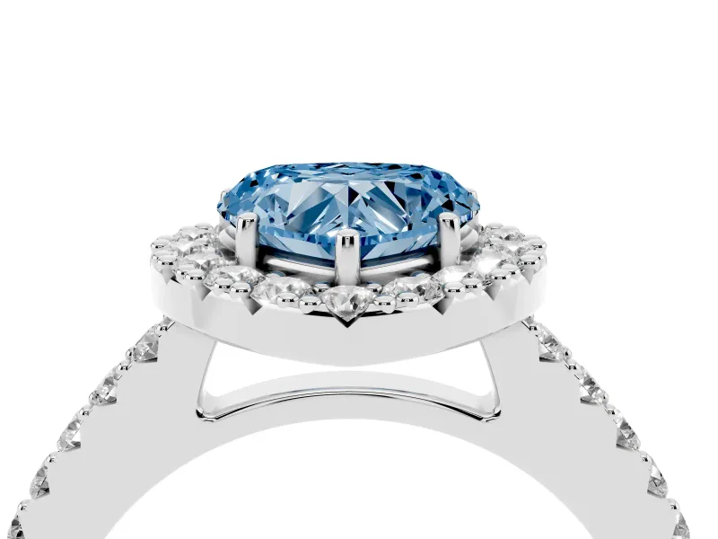 Fancy Blue Heart Cut Diamond Halo Pavé Solitaire Ring Set in Platinum with Prong-Set Center Stone