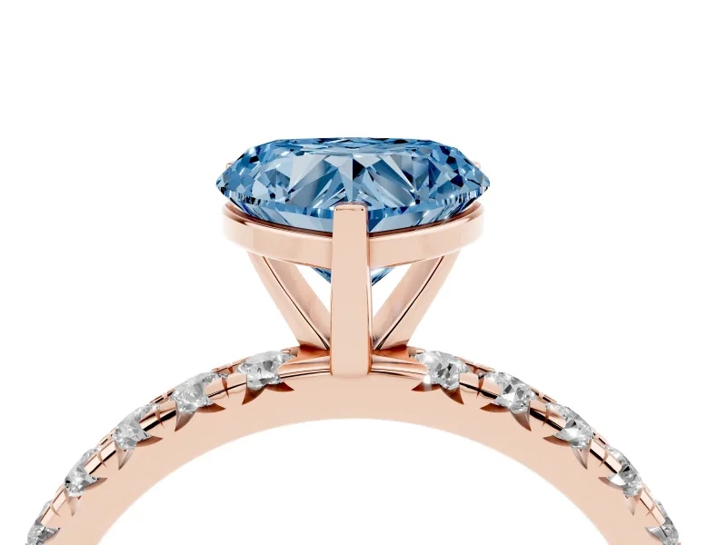 Fancy Blue Heart Cut Diamond Pavé Solitaire Ring Set in Rose gold with Round Band and Prong Setting