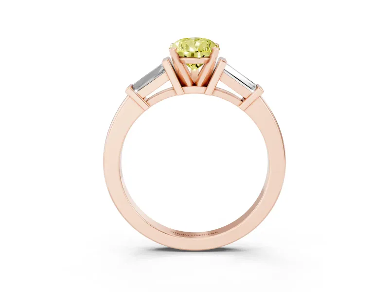 Fancy Yellow Pear Cut Diamond Solitaire Ring Set in Rose gold with Tapered Baguette Accents and Prong Setting