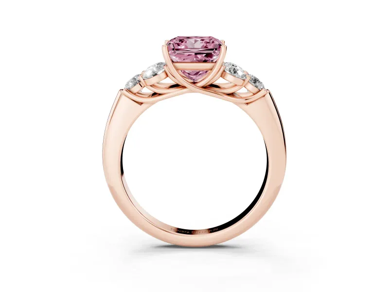 Fancy Pink Princess Cut Diamond Cluster Ring Set in Rose gold with Round Accent Stones and Prong Setting on a Plain Band