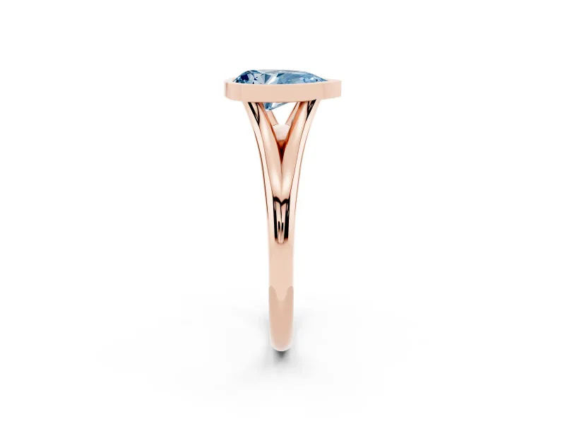 Fancy Blue Bezel Set Pear Cut Diamond Solitaire Ring Set in Rose gold with Tapered Band