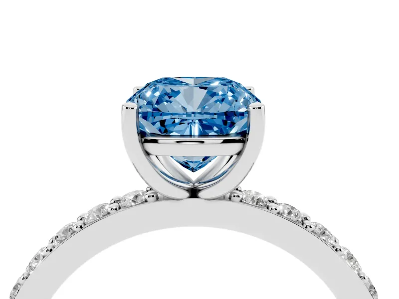 Fancy Blue Cushion Cut Diamond Solitaire Set in Platinum with Round Pavé Band and Prong Setting