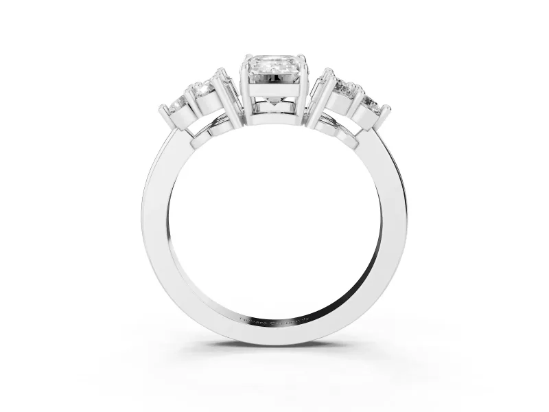 Emerald Cut Diamond Solitaire Ring Set in Silver with Cluster Accents on Each Side