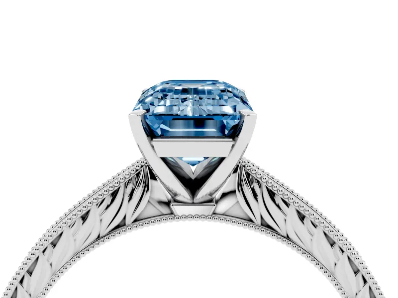 Fancy Blue Emerald Cut Diamond Solitaire Milgrain Engraved Band Set in White gold with Prong Setting