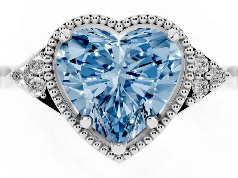 Fancy Blue Heart Cut Diamond Milgrain Solitaire Ring Set in White gold with Tapered Pavé Band and Prong Setting
