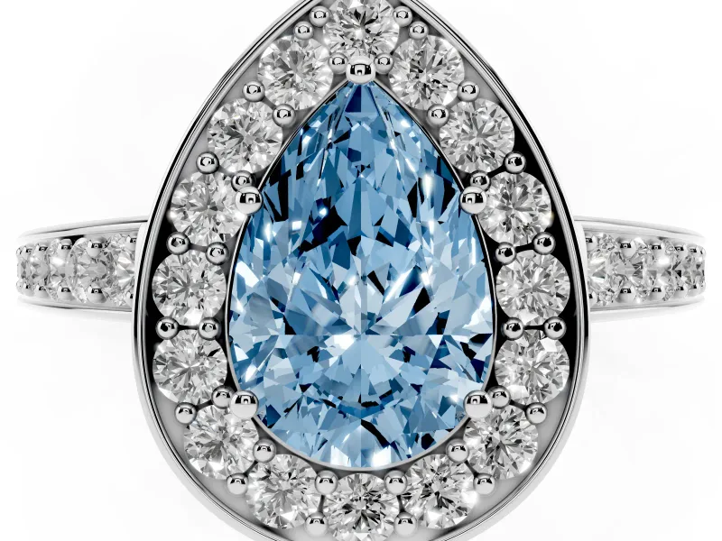 Fancy Blue Pear Cut Diamond Halo Pavé Engagement Ring Set in White gold with Bezel Setting