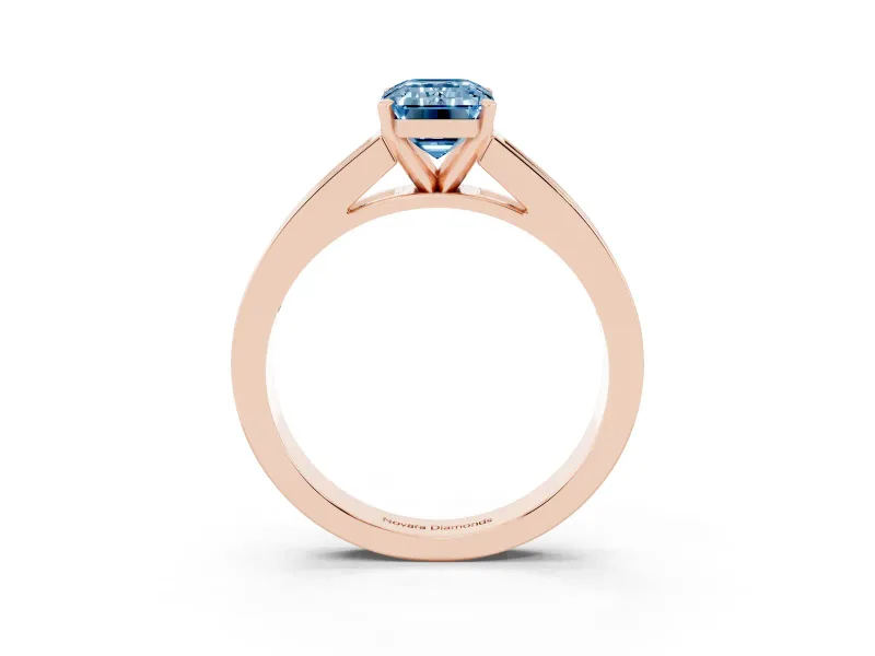 Fancy Blue Emerald Cut Diamond Solitaire Ring Set in Rose gold with Channel-Set Band and Prong Setting