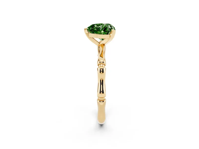 Fancy Green Heart Cut Diamond Solitaire Ring Set in Yellow gold with Bamboo Band and Prong Setting
