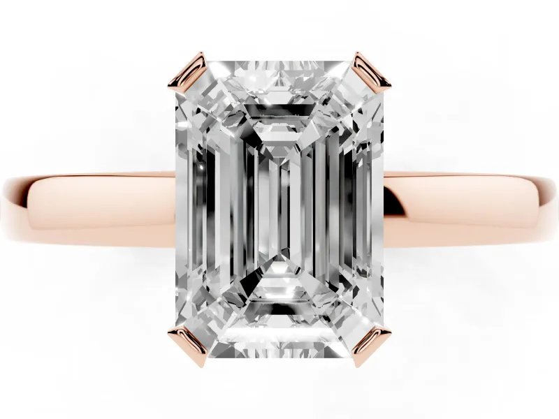 Emerald Cut Diamond Solitaire Ring Set in Rose gold with Prong Head and Smooth Polished Band