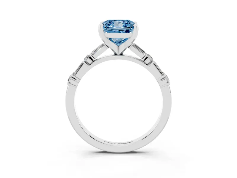 Fancy Blue Princess Cut Diamond Solitaire Set in Platinum with Side Baguettes and Channel Set Band