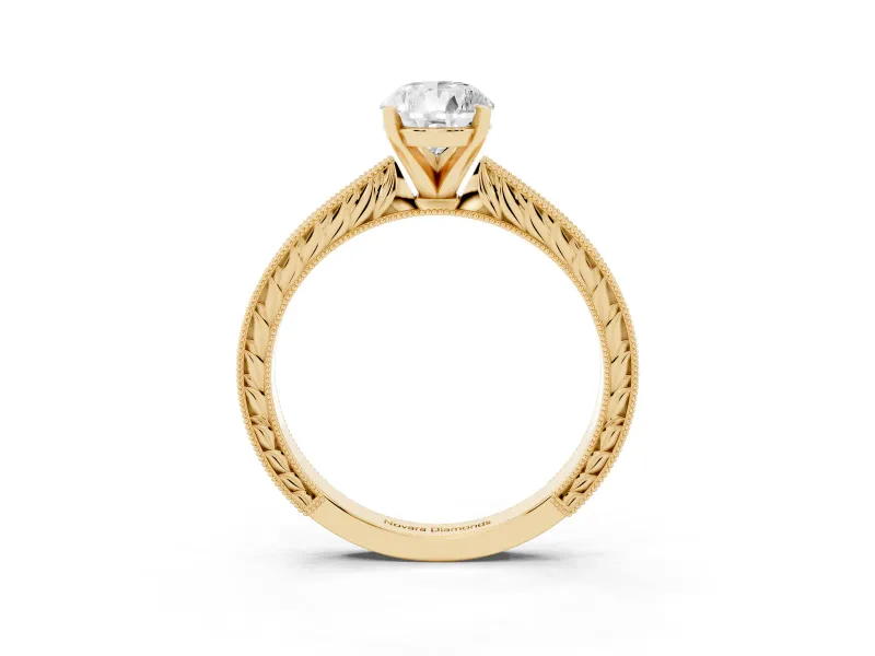 Pear Cut Diamond Solitaire Milgrain Engraved Band Set in Yellow gold with Prong Setting