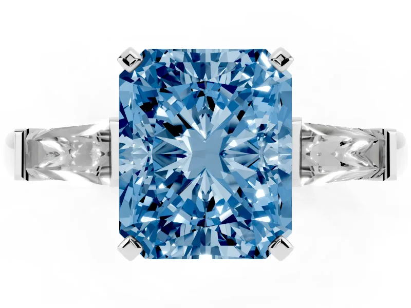 Fancy Blue Radiant Cut Diamond Solitaire Ring Set in White gold with Tapered Baguette Side Stones and Prong Setting