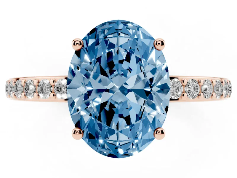 Fancy Blue Oval Cut Diamond Pavé Band Ring Set in Rose gold with Prong-Set Center Stone