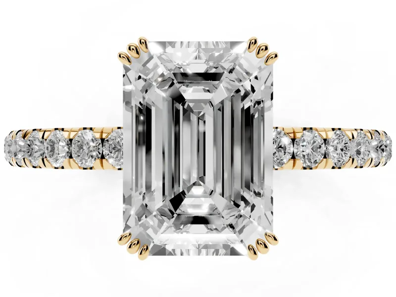 Emerald Cut Diamond Brilliant Solitaire Set in Yellow gold with Pavé Band and Claw Prong Setting