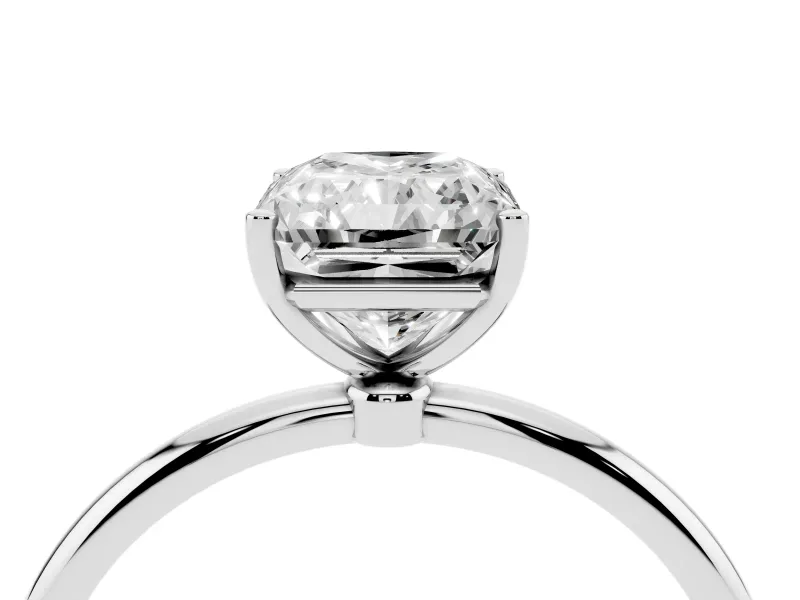 Radiant Cut Diamond Solitaire Engagement Ring Set in White gold with Thin Band and Prong Setting