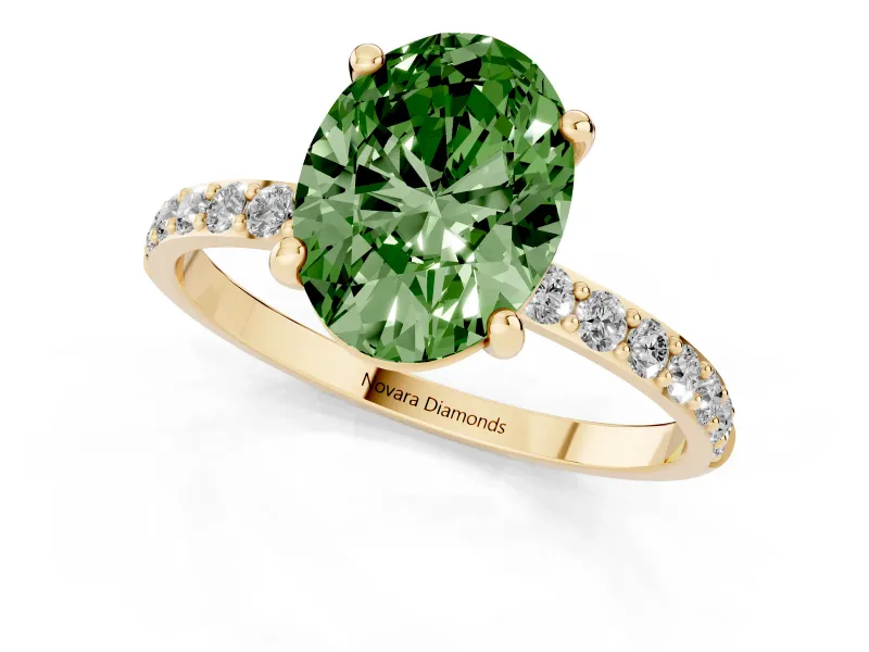 Fancy Green Oval Cut Diamond Solitaire Ring Set in Yellow gold with Round Pavé Band and Prong Setting