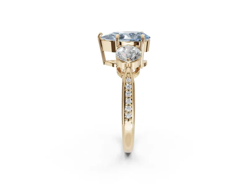 Pear-Shaped Three Stone Engagement Ring Setting for a Fancy Blue Lab-Grown Diamond | Tapered Pave Band | Yellow Gold